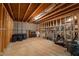 Large unfinished basement has wooden framing, and ductwork, offering ample room for storage or expansion at 2403 Wistful Way, Marietta, GA 30066