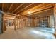 Wide angle view of unfinished basement with exposed framing, and concrete flooring, ready for your personal touch at 2403 Wistful Way, Marietta, GA 30066