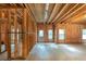 Unfinished basement showcases exposed insulation, ductwork, and framing, allowing for custom design at 2403 Wistful Way, Marietta, GA 30066