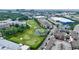 Aerial view showcases the community's proximity to the golf course, IKEA, and surrounding cityscape at 390 17Th Nw St # 2053, Atlanta, GA 30363