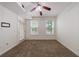 Cozy bedroom featuring plush carpeting, two windows and ample natural light at 390 17Th Nw St # 2053, Atlanta, GA 30363