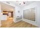 Dining area with natural light from a unique glass block window feature at 390 17Th Nw St # 2053, Atlanta, GA 30363