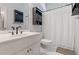 Bathroom with a white vanity, neutral tile, and a shower with curtain at 40 Costleys Bridge Dr, Oxford, GA 30054