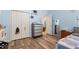 Bright blue bedroom featuring a double door closet at 40 Costleys Bridge Dr, Oxford, GA 30054
