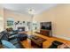 Inviting living room with hardwood floors, a fireplace, and comfortable seating, ideal for relaxation and entertainment at 40 Costleys Bridge Dr, Oxford, GA 30054
