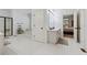 Bright primary bathroom showcases a walk-in shower, soaking tub, and dual vanity at 34 Johnston Nw Row, Cartersville, GA 30121