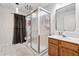 Bright bathroom featuring a glass shower, tiled floors, and ample counter space at 34 Johnston Nw Row, Cartersville, GA 30121