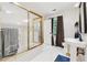 Well-lit bathroom with a glass-enclosed shower and a pedestal sink at 34 Johnston Nw Row, Cartersville, GA 30121