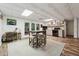 Living space with a kitchenette, dining area, and access to a patio at 34 Johnston Nw Row, Cartersville, GA 30121