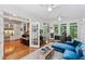 Versatile office with hardwood floors, lots of natural light, and built in cabinetry at 34 Johnston Nw Row, Cartersville, GA 30121