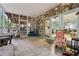 Screened porch featuring stone accents and access to both indoor and outdoor spaces at 34 Johnston Nw Row, Cartersville, GA 30121