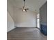 Bright living room with vaulted ceilings, fireplace, wood floors, and neutral paint at 3045 Binghampton Ln, Lawrenceville, GA 30044