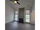 Living room with high ceilings, fireplace, lots of natural light and wood floors at 3045 Binghampton Ln, Lawrenceville, GA 30044