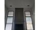 Living room featuring high ceilings, fireplace, lots of natural light at 3045 Binghampton Ln, Lawrenceville, GA 30044
