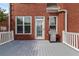 An elevated deck featuring a stainless steel grill, perfect for outdoor entertaining at 1979 Spivey Village Dr, Jonesboro, GA 30236