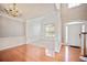 Bright living room with hardwood floors and wainscoting, offering a cozy and inviting space at 1979 Spivey Village Dr, Jonesboro, GA 30236