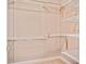 Spacious walk-in closet with custom shelving, perfect for organizing all your clothing at 1979 Spivey Village Dr, Jonesboro, GA 30236