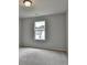 This bedroom features neutral walls, carpet and a window for natural light at 3968 Annsbury Court, Lilburn, GA 30047