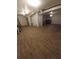 Spacious basement with wood floors and plenty of room for storage at 6005 Hendrix Rd, Cumming, GA 30040