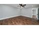 Bedroom featuring hardwood floors and a ceiling fan at 858 Pates Creek Rd, Stockbridge, GA 30281