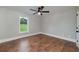 Bedroom with hardwood floors and a view at 858 Pates Creek Rd, Stockbridge, GA 30281