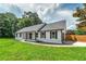 Lovely single-story home featuring a well-manicured lawn, charming shutters, and an attached garage at 858 Pates Creek Rd, Stockbridge, GA 30281