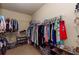 Organized walk-in closet offers plenty of space for storage at 1404 Fairwinds Ct, Loganville, GA 30052