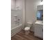 Bright bathroom featuring a shower-tub combination and a modern vanity with white cabinets at 3232 Cyrus Creek Dr, Kennesaw, GA 30152