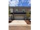 New construction townhome with a front-entry garage and fresh landscaping at 3232 Cyrus Creek Dr, Kennesaw, GA 30152