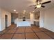 Open-concept kitchen features a center island, modern cabinets, and stainless steel appliances at 3232 Cyrus Creek Dr, Kennesaw, GA 30152