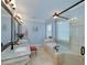 This bathroom features double sinks, soaking tub, and a glass shower at 825 Chalet Hls, Mcdonough, GA 30253