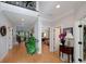 Spacious hallway with hardwood floors, neutral walls, and access to various rooms in the home at 825 Chalet Hls, Mcdonough, GA 30253