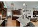 Open kitchen featuring granite counters, bar seating, and stainless appliances at 825 Chalet Hls, Mcdonough, GA 30253