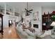 Spacious living room with fireplace, high ceilings, and open floor plan at 825 Chalet Hls, Mcdonough, GA 30253