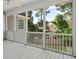 Screened-in back patio with a view of the lush backyard at 5831 Wembley Dr, Douglasville, GA 30135