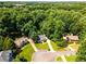 An aerial view of a home on a cul-de-sac with a large lot at 6280 Autry Mill Rd, Cumming, GA 30028