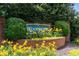 The Woodberry neighborhood sign with lush landscaping at 6280 Autry Mill Rd, Cumming, GA 30028