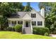 Charming two-story home featuring a welcoming front porch and well-maintained landscaping at 6280 Autry Mill Rd, Cumming, GA 30028