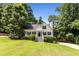 Beautiful exterior showcasing a well-manicured lawn and inviting front facade at 6280 Autry Mill Rd, Cumming, GA 30028