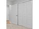 Bedroom with carpet flooring, neutral walls, and closet with folding doors at 6441 Michell Way, Douglasville, GA 30135