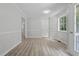 Bright dining area featuring vinyl floors and a large window at 6441 Michell Way, Douglasville, GA 30135