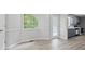Bright dining area featuring vinyl floors and a large window at 6441 Michell Way, Douglasville, GA 30135