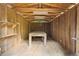 View of the inside of the storage shed, featuring a workbench at 6441 Michell Way, Douglasville, GA 30135