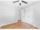 Bedroom with hardwood floors, ceiling fan and closet at 6671 Gano Dr, Riverdale, GA 30274