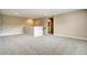Bright bonus room with neutral paint, carpeted floor, and staircase access to other floors at 1858 Belmore Se St, Smyrna, GA 30080