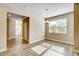 Bright dining room featuring hardwood floors and a view of the entry hallway at 1858 Belmore Se St, Smyrna, GA 30080