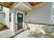 Covered entryway with brick accents leading to a stylish front door at 1858 Belmore Se St, Smyrna, GA 30080