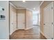 Hallway features hard wood floors and leads to a powder room and entry at 1858 Belmore Se St, Smyrna, GA 30080