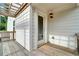 Charming outdoor patio featuring wood decking, pergola, and a door, perfect for relaxing and enjoying fresh air at 1858 Belmore Se St, Smyrna, GA 30080