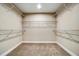 Spacious walk-in closet with carpet and wire shelving for optimal organization and storage space at 1858 Belmore Se St, Smyrna, GA 30080